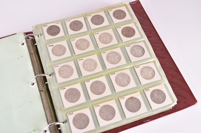 Lot 249 - Two albums containing a large collection of UK silver cupro-nickel and bronze coinage from 18th century to 20th century (over 600 coins)