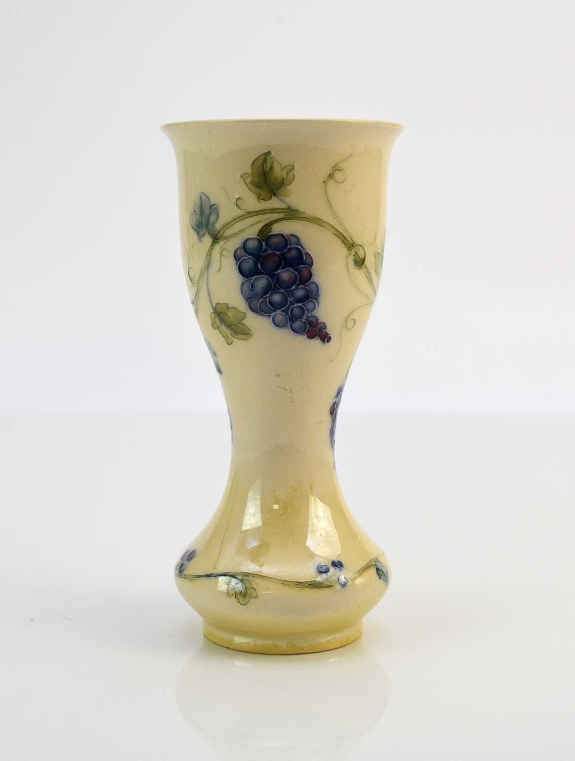 Lot 205 - William Moorcroft 'Grapes' lustre vase designed for Liberty & Co, circa 1908