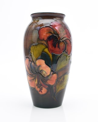 Lot 213 - Walter Moorcroft flambe 'Hibiscus' vase, circa 1954-60