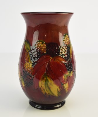 Lot 222 - William Moorcroft flambe 'Leaf and Blackberry' vase, circa 1935