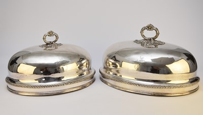 Lot 81 - Two graduated silver plated dish covers