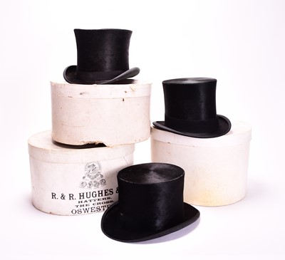 Lot 431 - Three black silk top hats, boxed