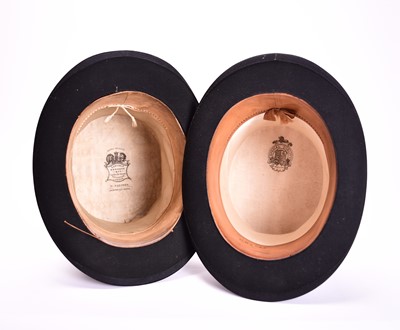 Lot 433 - Two black silk top hats, boxed
