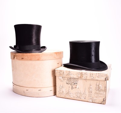 Lot 433 - Two black silk top hats, boxed