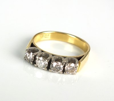 Lot 87 - A four stone diamond ring