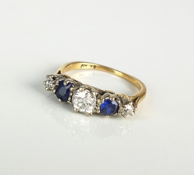 Lot 324 - An early 20th century five stone ring