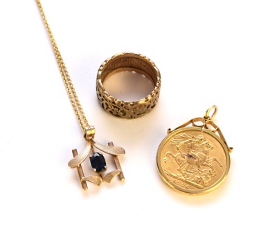 Lot 126 - A George V sovereign within 9ct gold pendant mount