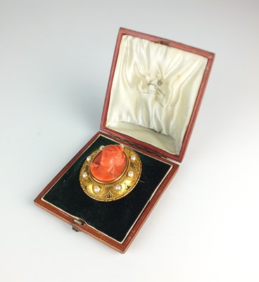 Lot 111 - A 19th century carved coral cameo brooch