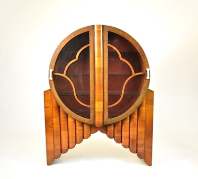 Lot 472 - An Art Deco 'Rocket; walnut display cabinet