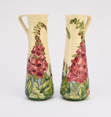 Lot 186 - A pair of Moorcroft 'Amberwood' jugs designed by Rachel Bishop, dated 2002