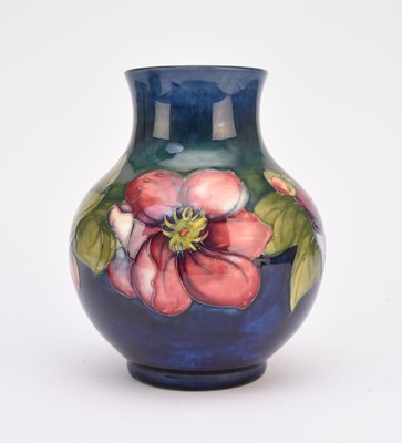 Lot 205 - Walter Moorcroft 'Clematis' vase, mid-20th century