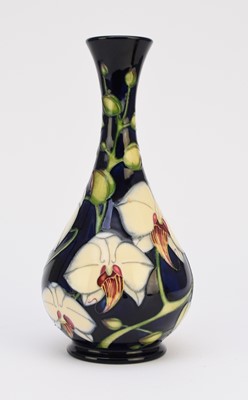 Lot 214 - Moorcroft limited edition 'Chatsworth Orchid' vase designed by Philip Gibson, dated 2001