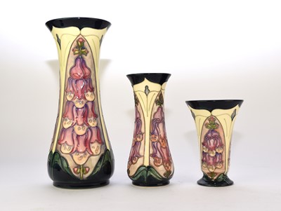 Lot 223 - Three Moorcroft 'Foxglove' vases designed by Rachel Bishop, circa 1995-98