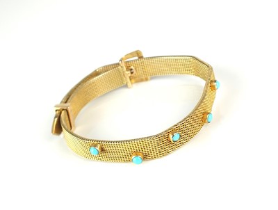 Lot 257 - A stylised buckle turquoise set bracelet