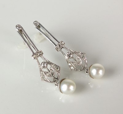Lot 61 - A pair of early 20th century style diamond and cultured pearl ear pendants