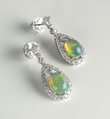 Lot 44 - A pair of 18ct white gold opal and diamond earrings