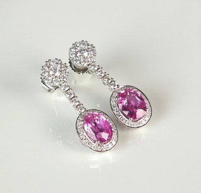 Lot 54 - A pair of 18ct white gold pink sapphire and diamond ear pendants