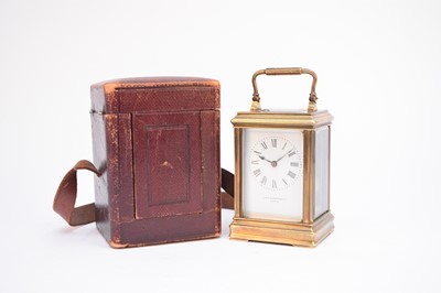 Lot 453 - A French gilt brass carriage clock with carrying case