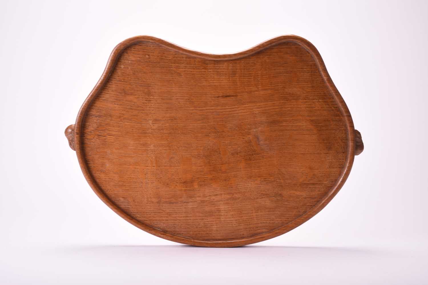 Lot 399 - Studio of Robert Mouseman Thompson (Kilburn), an adzed oak tea tray