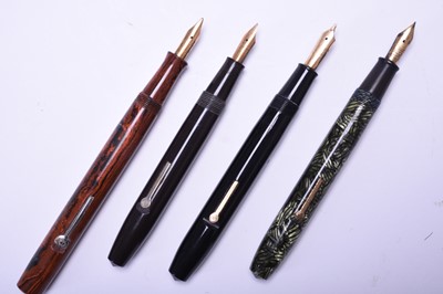 Lot 385 - Four vintage Conway Stewart fountain pens