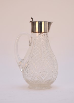 Lot 17 - A silver mounted glass claret jug