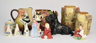 Lot 98 - A group including three rare Royal Doulton figures (damages)