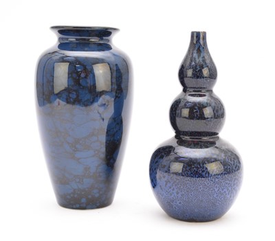 Lot 100 - A Royal Doulton dark blue flambe vase, and one other