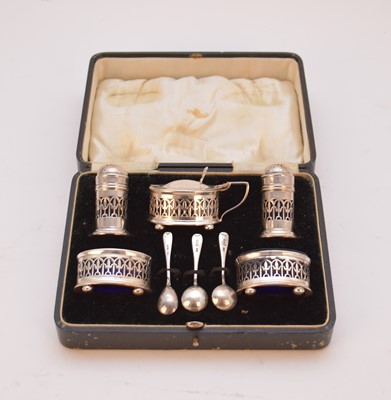 Lot 25 - A cased five piece silver cruet set