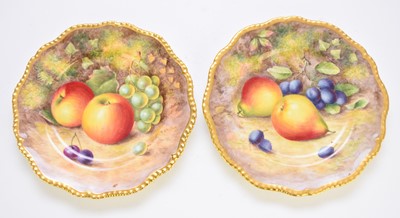 Lot 106 - A pair of Royal Worcester cabinet plates painted with fruit by Ayrton, dated 1952