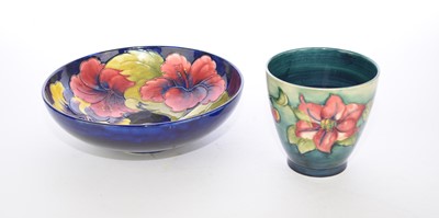 Lot 255 - Walter Moorcroft 'Pansy' fruit bowl and a 'Clematis' vase