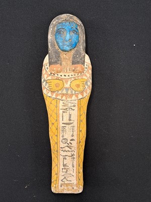 Lot 533 - A reproduction Shabti and coffin case, late 19th to early 20th century