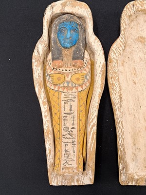Lot 533 - A reproduction Shabti and coffin case, late 19th to early 20th century