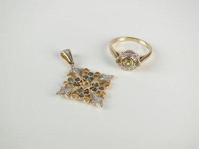 Lot 233 - A 14ct gold peridot and diamond cluster ring and a 14ct gold topaz and diamond pendant