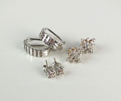 Lot 275 - Three pairs of diamond set earrings