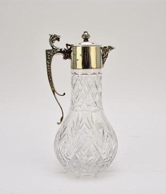 Lot 63 - A silver mounted glass claret jug
