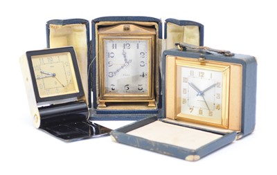 Lot 643 - A Jaeger-LeCoultre travel alarm clock and two other travel clocks