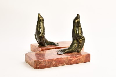Lot 547 - An Austrian bronze figure of a dog and two bronze seal bookends
