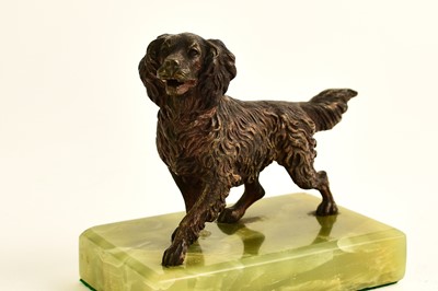 Lot 547 - An Austrian bronze figure of a dog and two bronze seal bookends