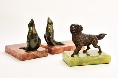 Lot 547 - An Austrian bronze figure of a dog and two bronze seal bookends