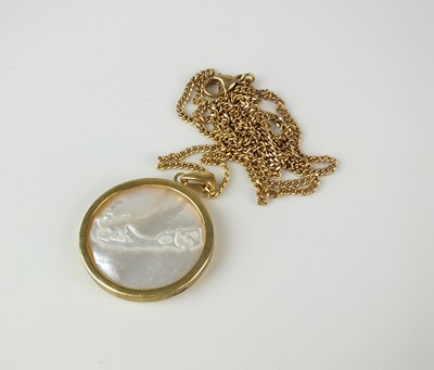 Lot 153 - A mother of pearl pendant on chain