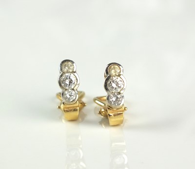 Lot 214 - A pair of diamond earrings