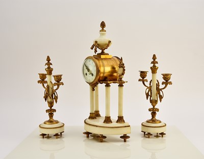 Lot 621 - A late 19th century French Portico clock garniture