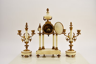 Lot 621 - A late 19th century French Portico clock garniture