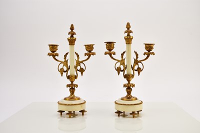Lot 621 - A late 19th century French Portico clock garniture