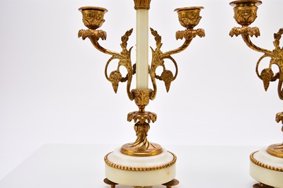 Lot 621 - A late 19th century French Portico clock garniture