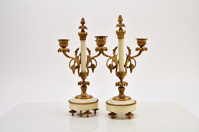 Lot 621 - A late 19th century French Portico clock garniture