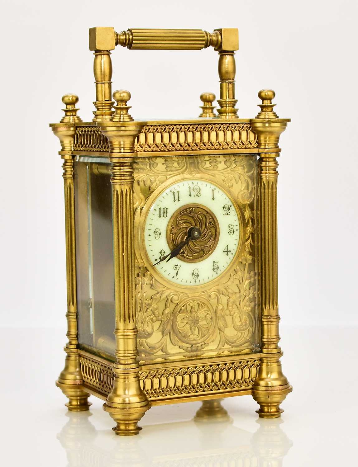 Lot 634 - A French early 20th century brass carriage timepiece
