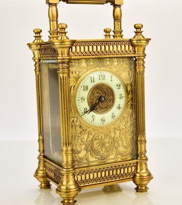 Lot 634 - A French early 20th century brass carriage timepiece