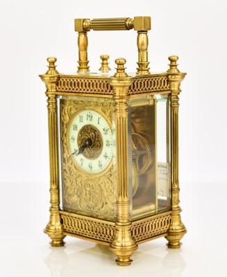Lot 634 - A French early 20th century brass carriage timepiece