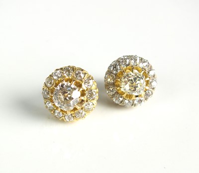 Lot 86 - A pair of diamond cluster earrings